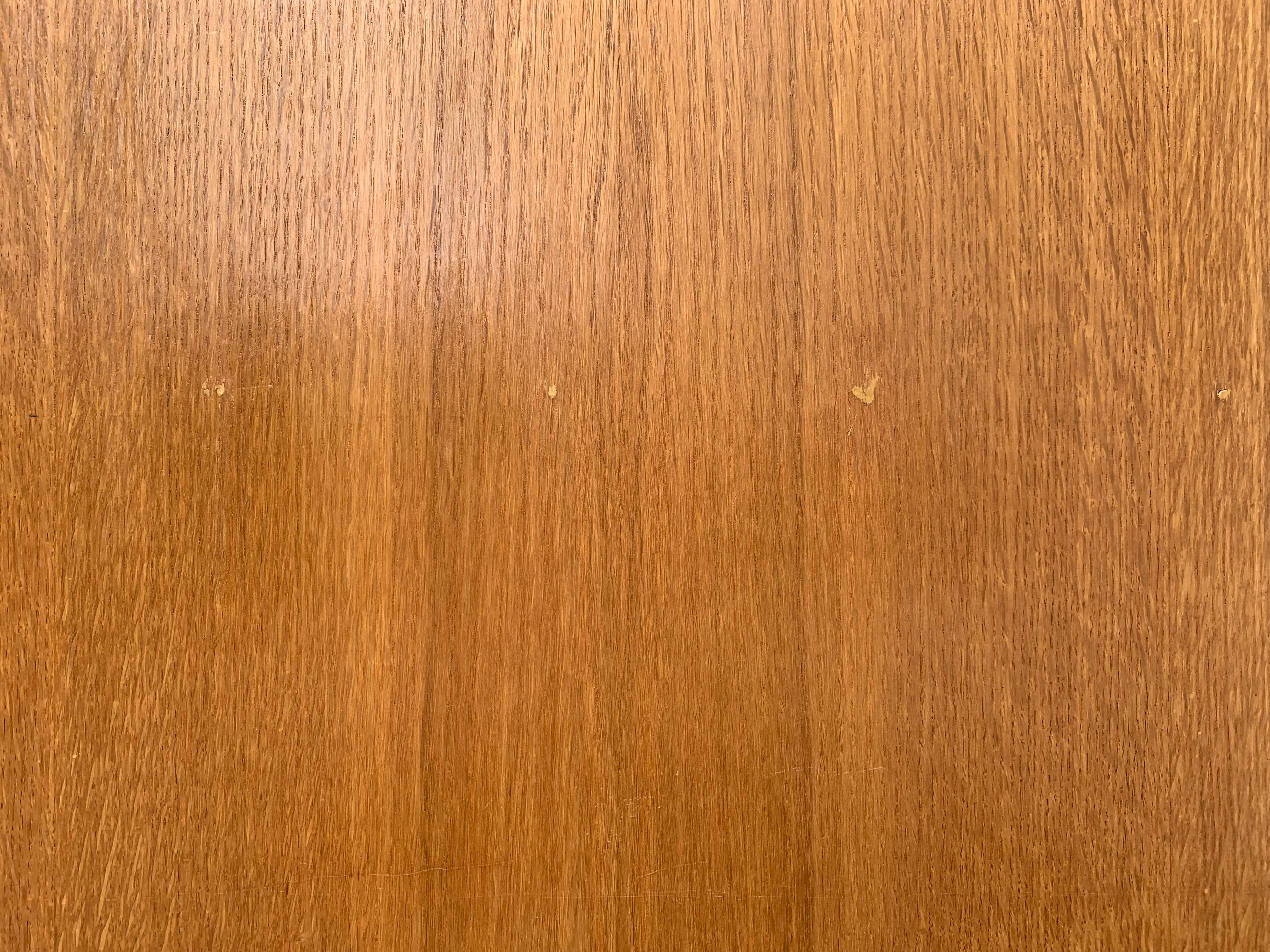 Rattan wardrobe with tapered legs from the 1960s.