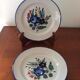 Set of 2 old painted terracotta plates enamelled