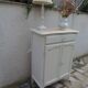 Small vintage buffet reimagined in pearl grey, wooden top.