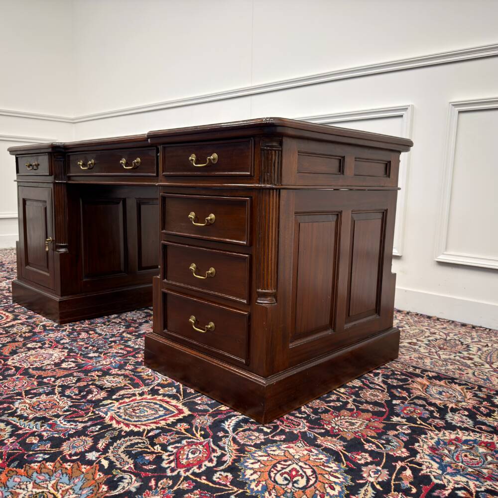 Classic English desk with green leather inlay.