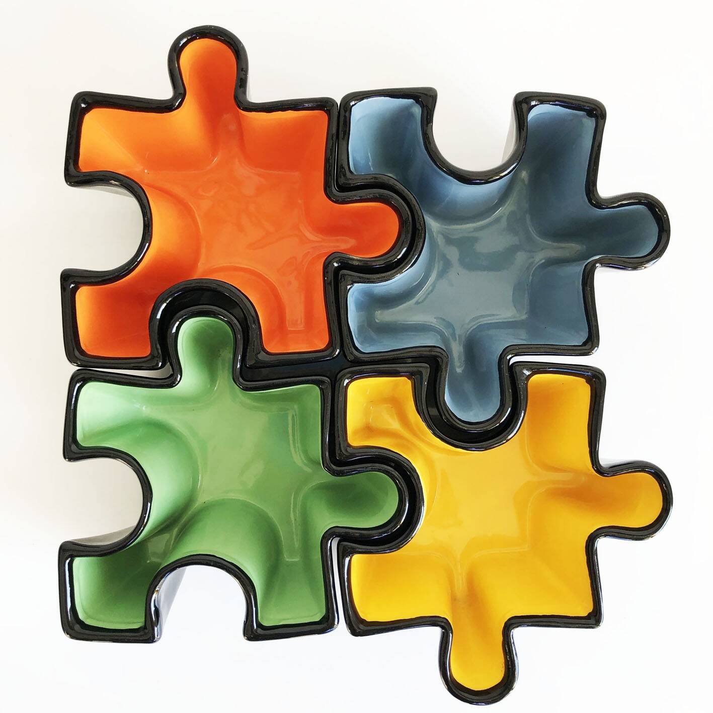 Ensemble de vide poches puzzle en céramique. Italie, années 80
