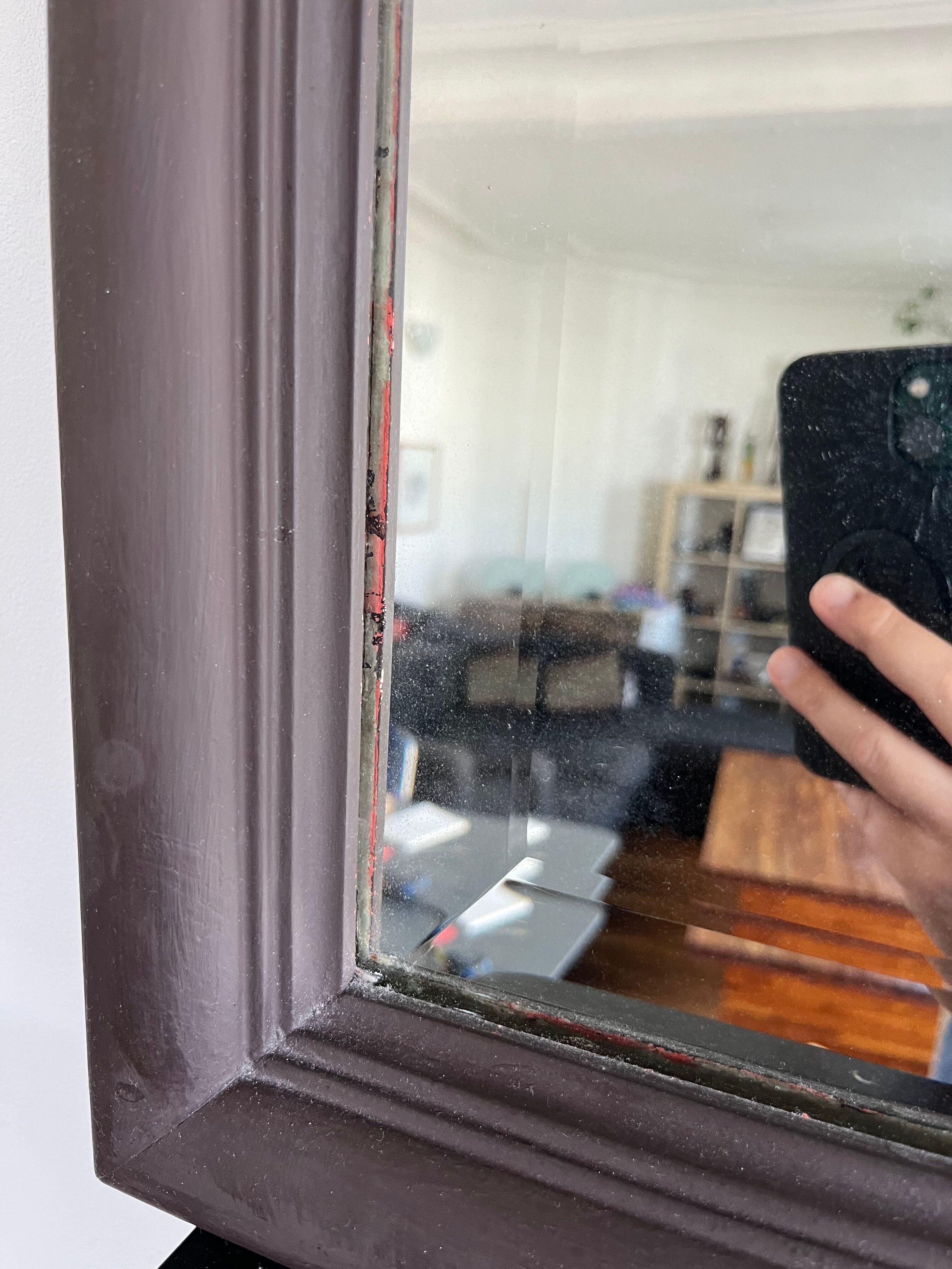 Beveled vintage mirror in painted wood 95x68cm