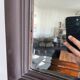 Beveled vintage mirror in painted wood 95x68cm