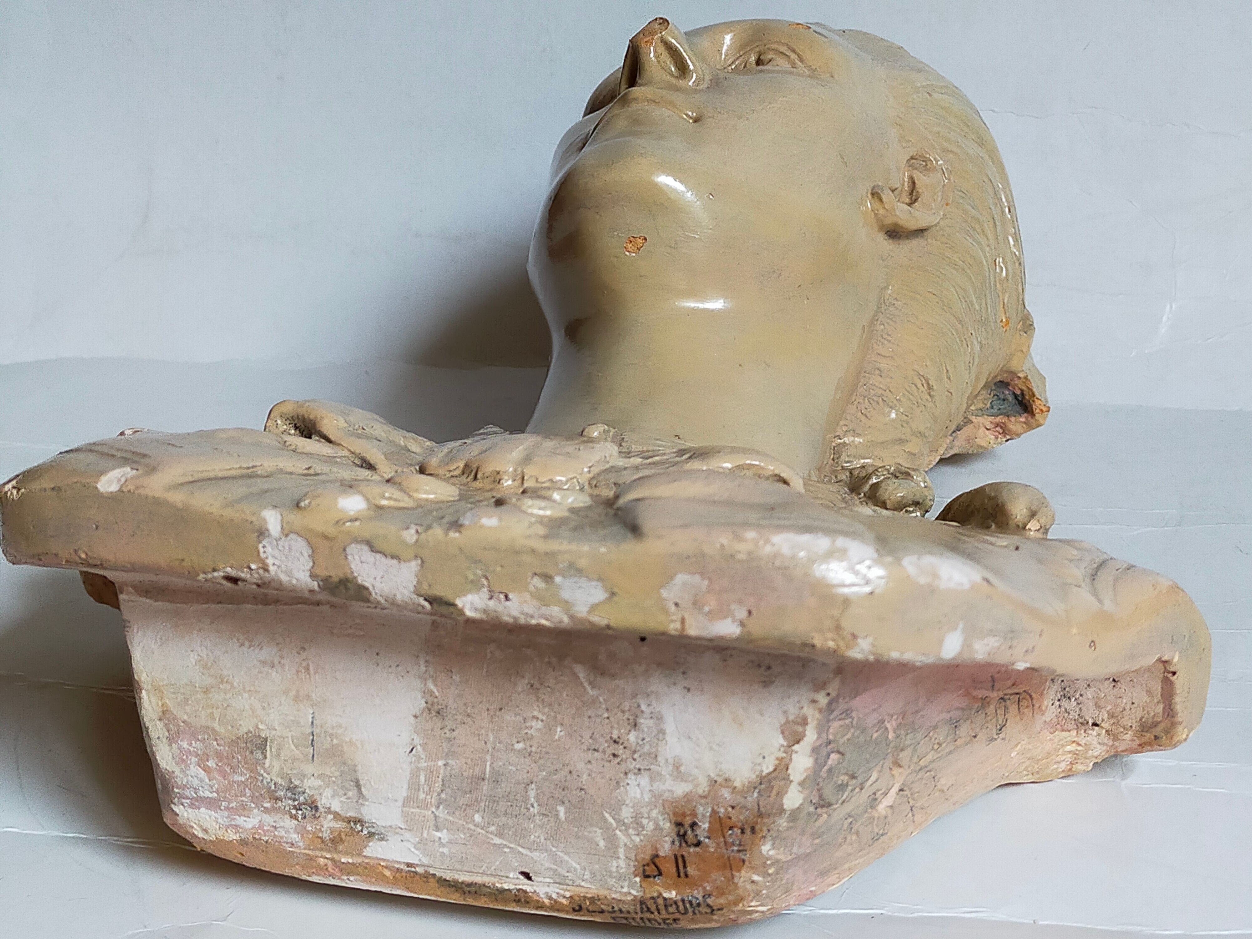 Bust of a woman "the elegant"XIXth in painted plaster signed on its solid wood base