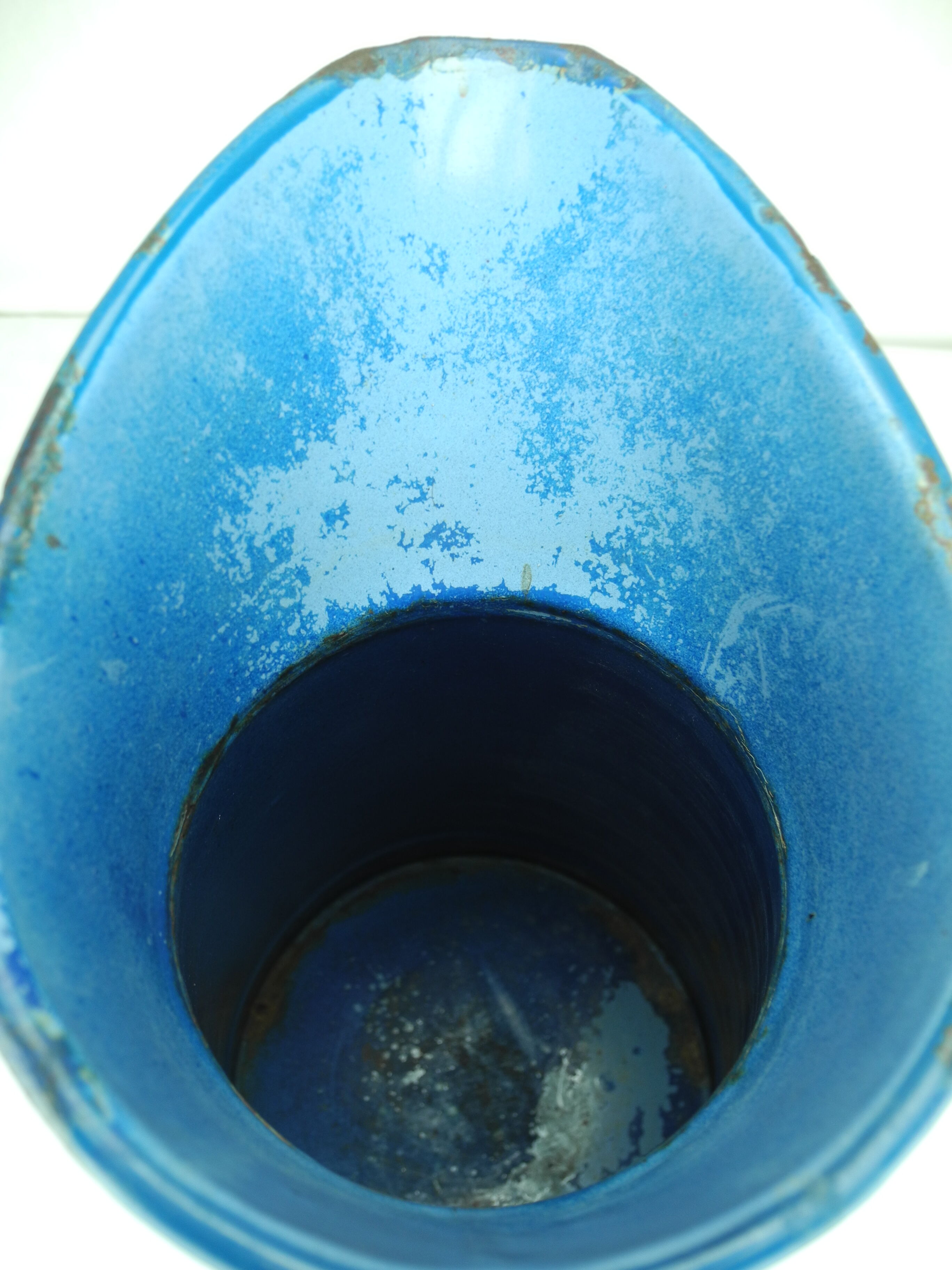 Old vintage enamelled sheet metal jug