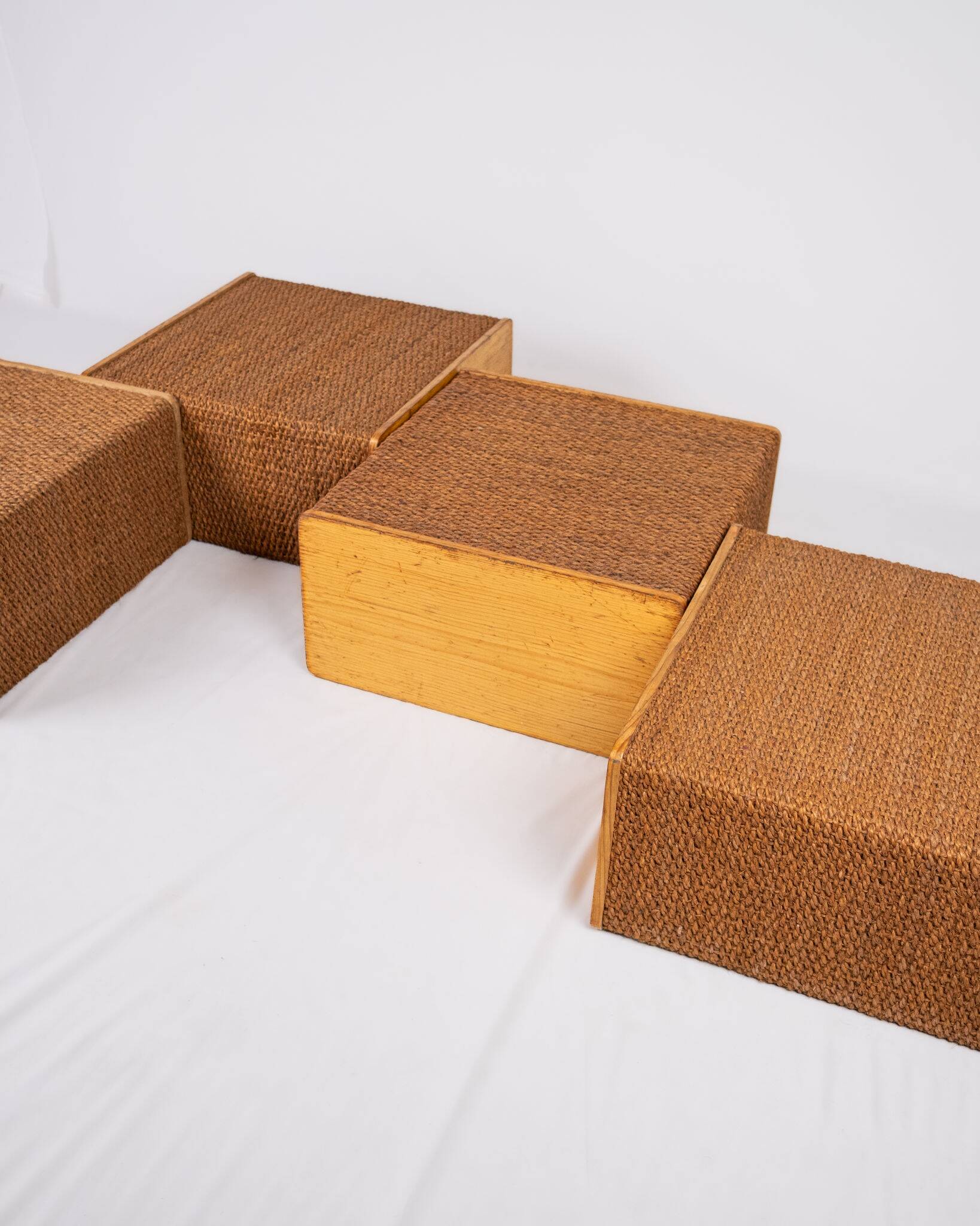 Series of 4 low tables made of cord and pine, France, 1980s.