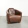 Cowhide armchair in Aviator design in a warm brown colour