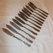 Lot of 12 metal fish cutlery sets.