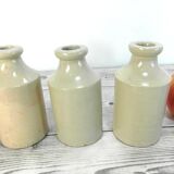 Lot of 3 sandstone bottles