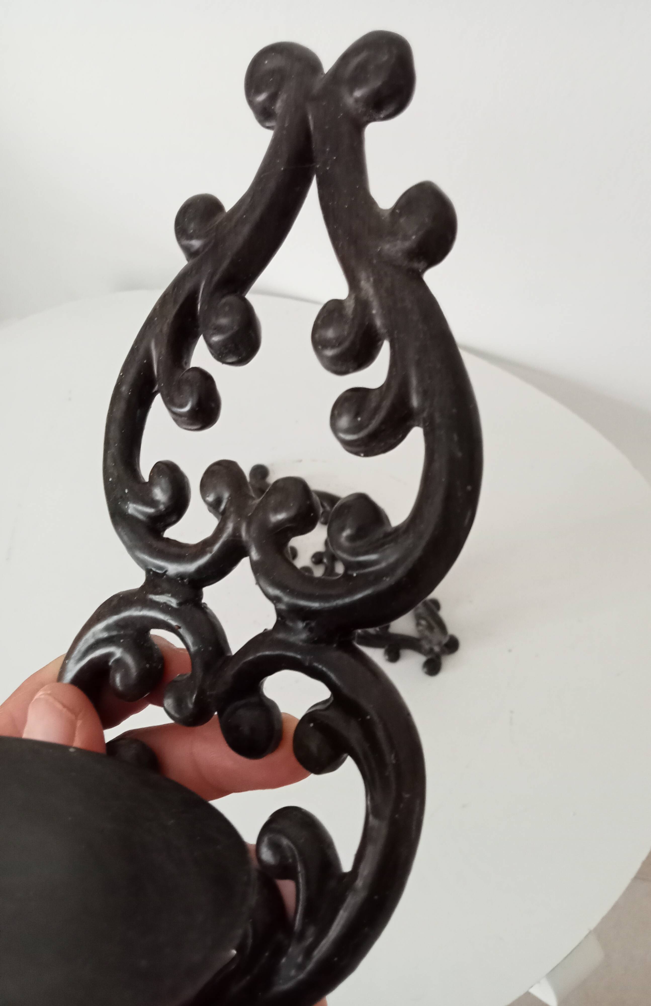 Antique wall candle holder in enamelled cast iron