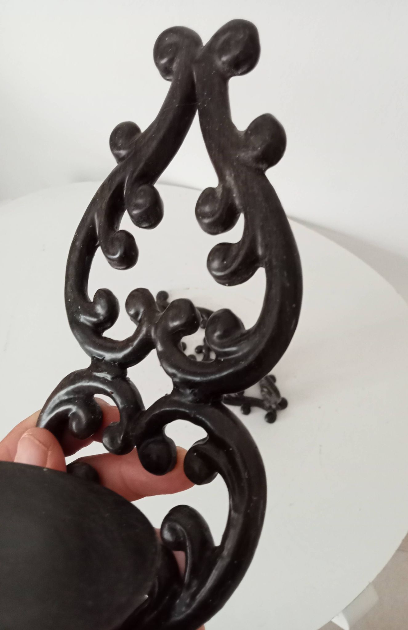 Antique wall candle holder in enamelled cast iron