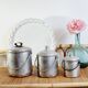 3 mismatched milk jars