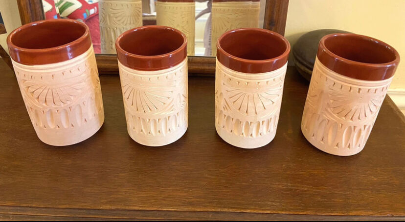 Four hand-sculpted ceramic glasses