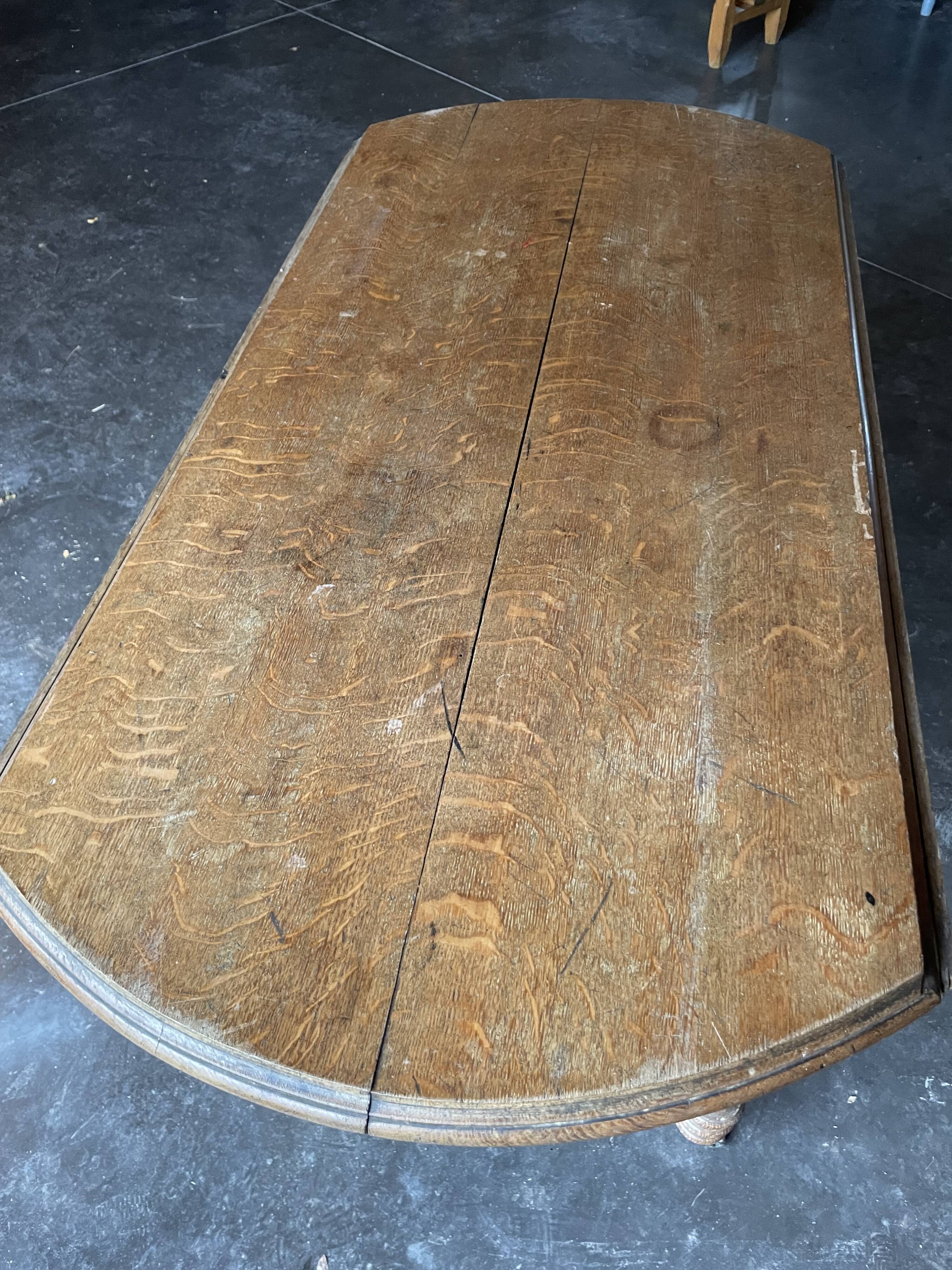 Old wooden table with folding flaps