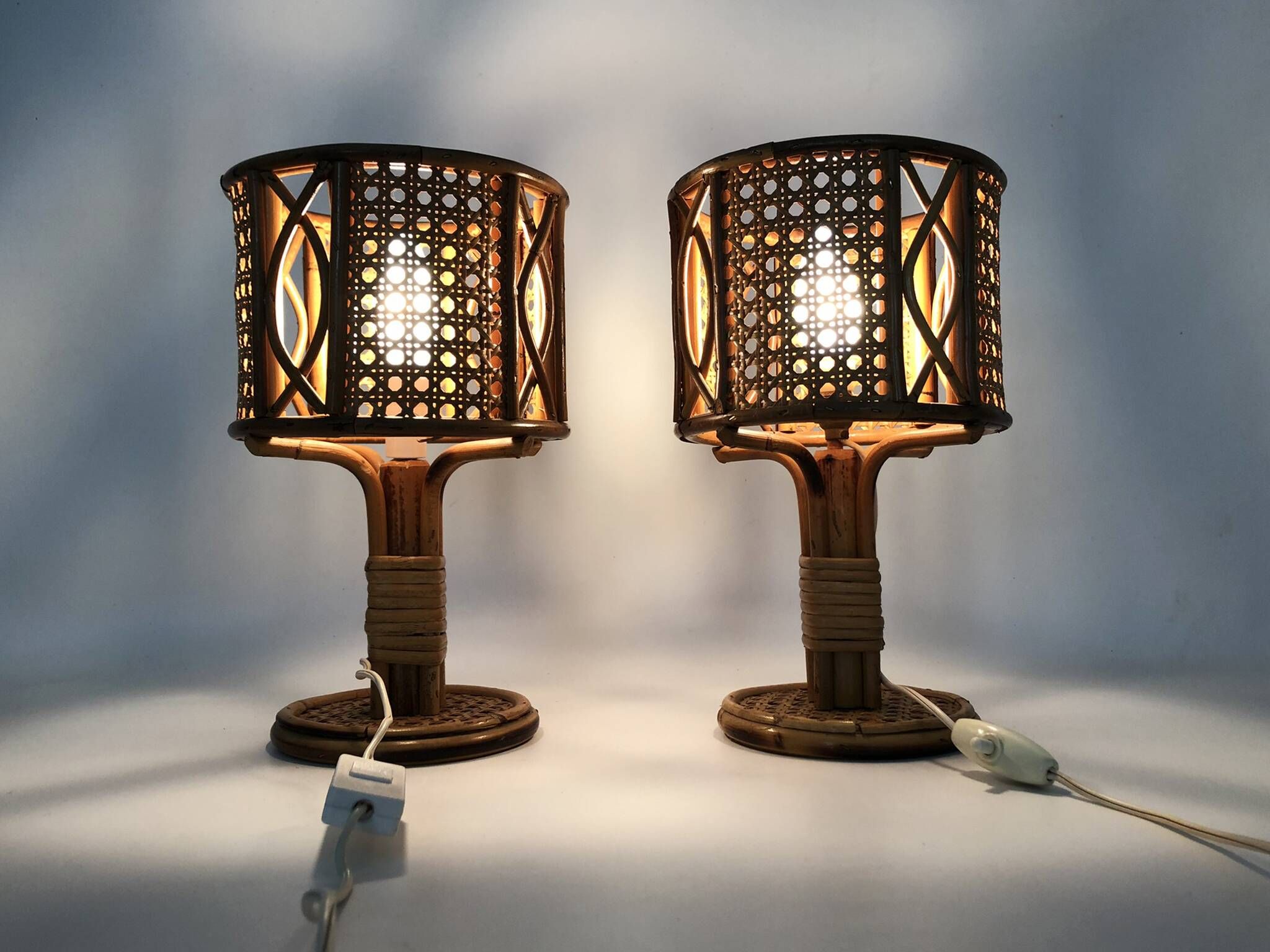 Pair of bamboo rattan cane lamps. Italy, 1950s and 1960s.