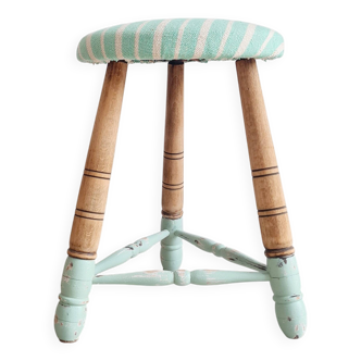 Wooden tripod stool with striped seat