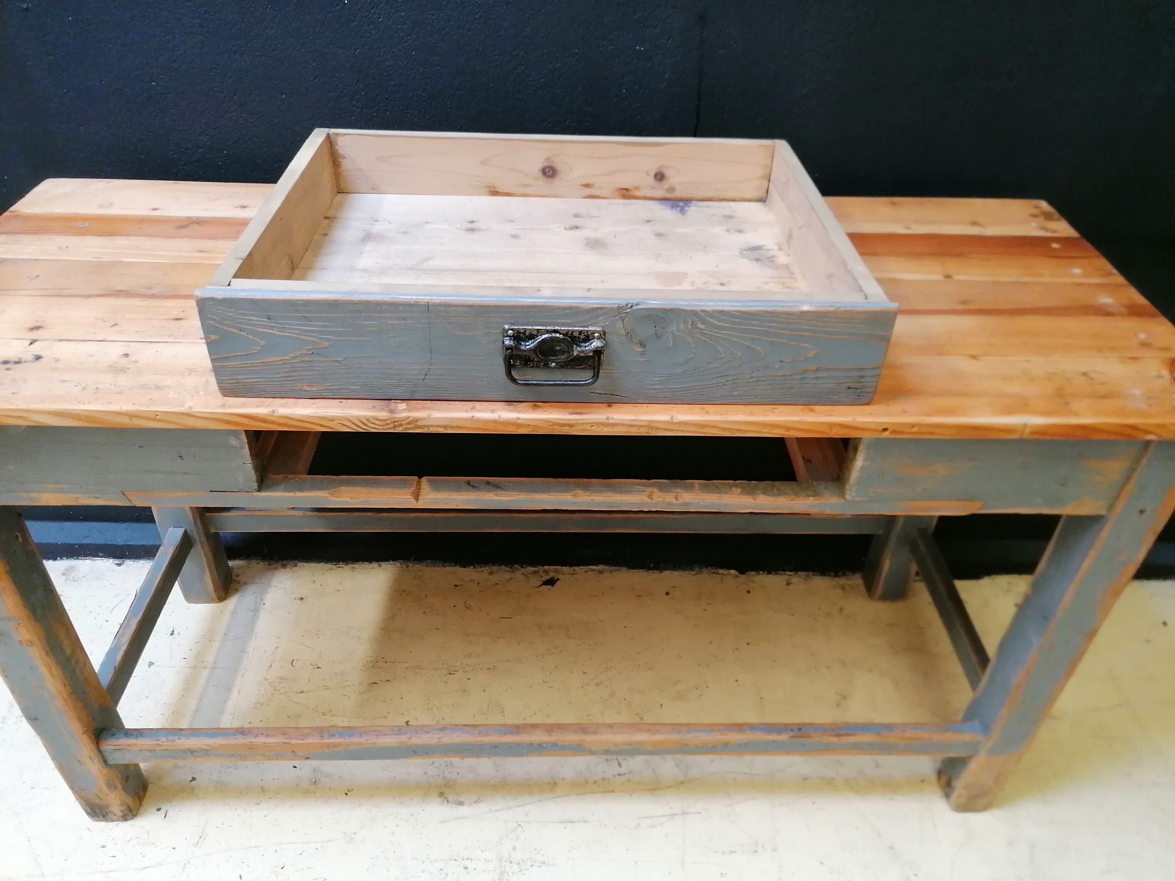 Patinated drapery table