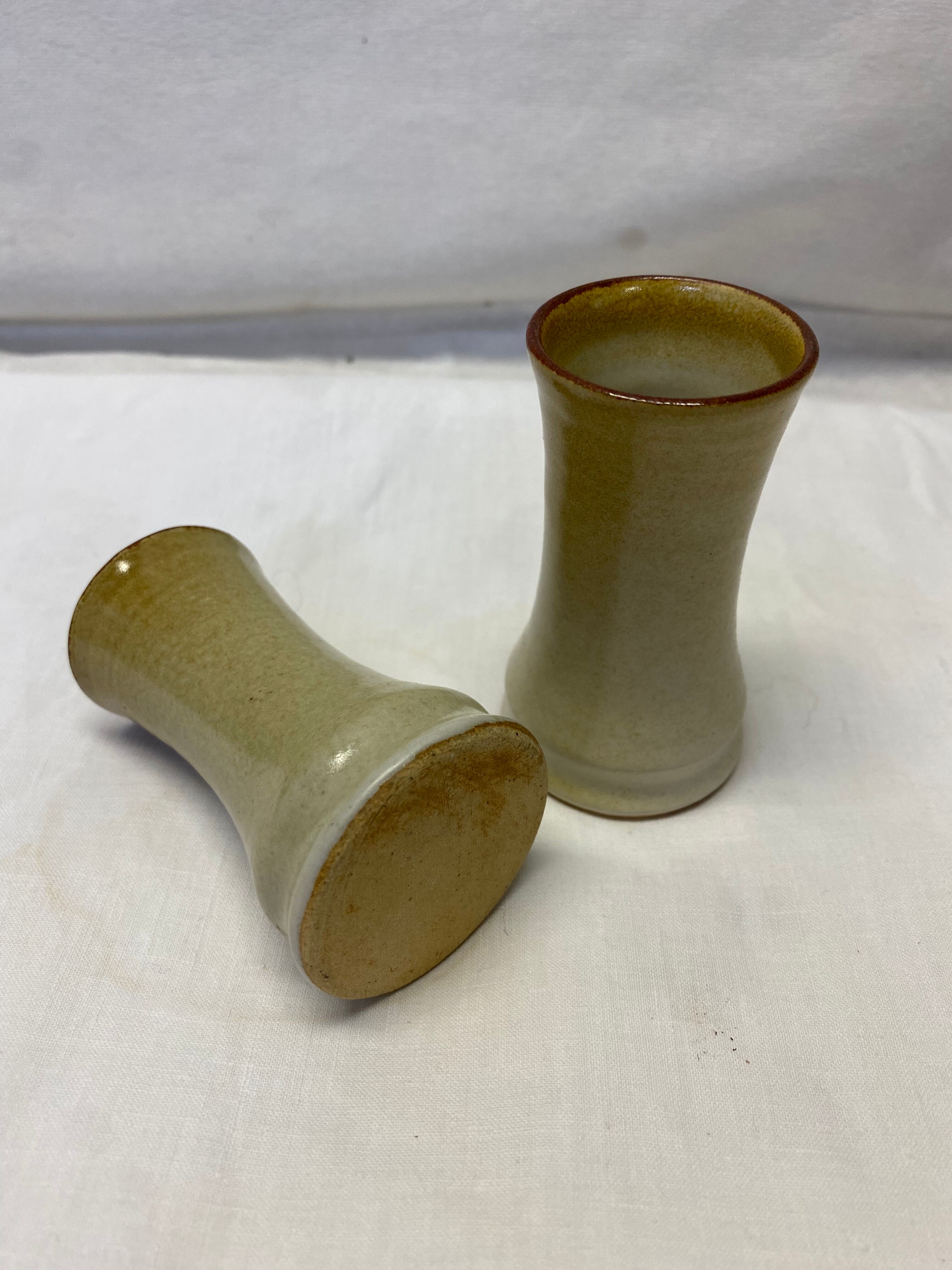Pair of sandstone candle holders