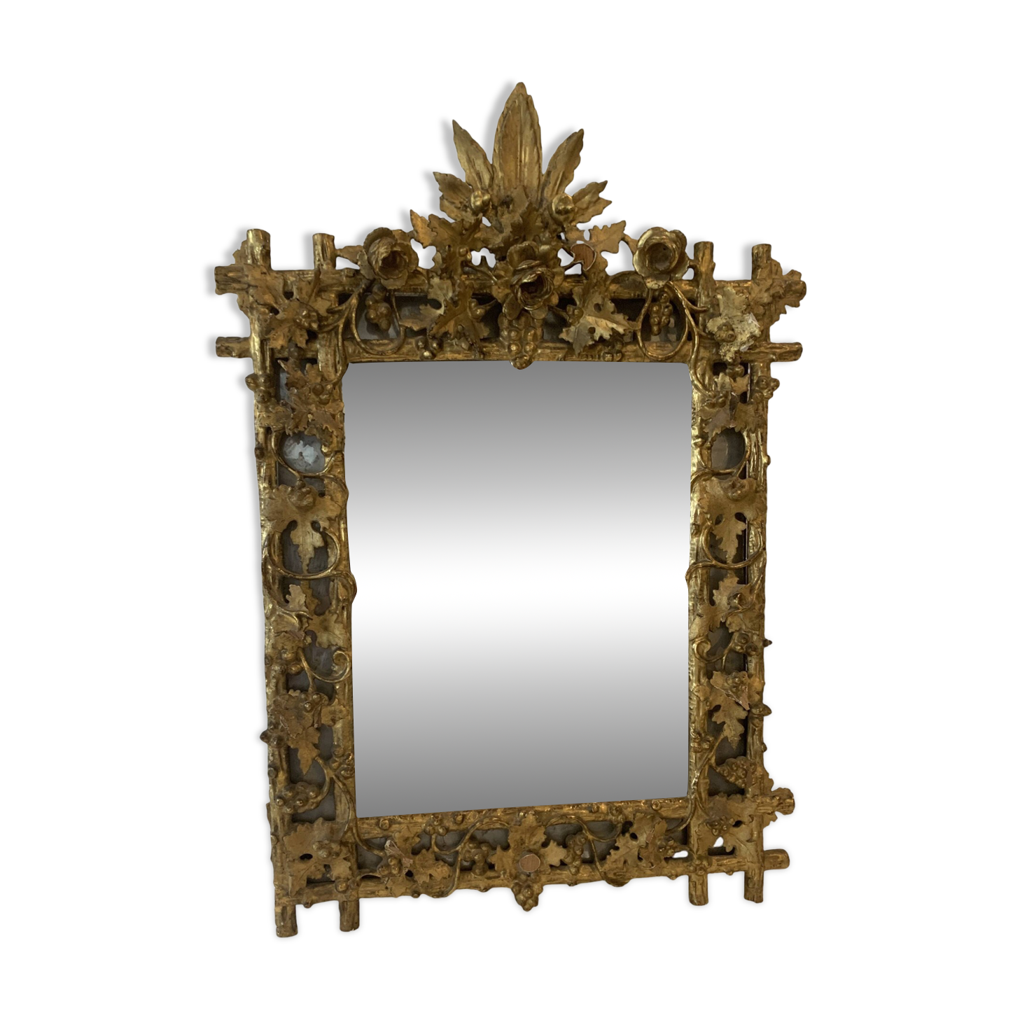 Louis XVI style mirror in carved wood and gilded with gold leaf, 19th century