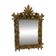 Louis XVI style mirror in carved wood and gilded with gold leaf, 19th century