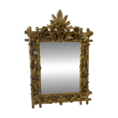 Louis XVI style mirror in carved wood and gilded with gold leaf, 19th century