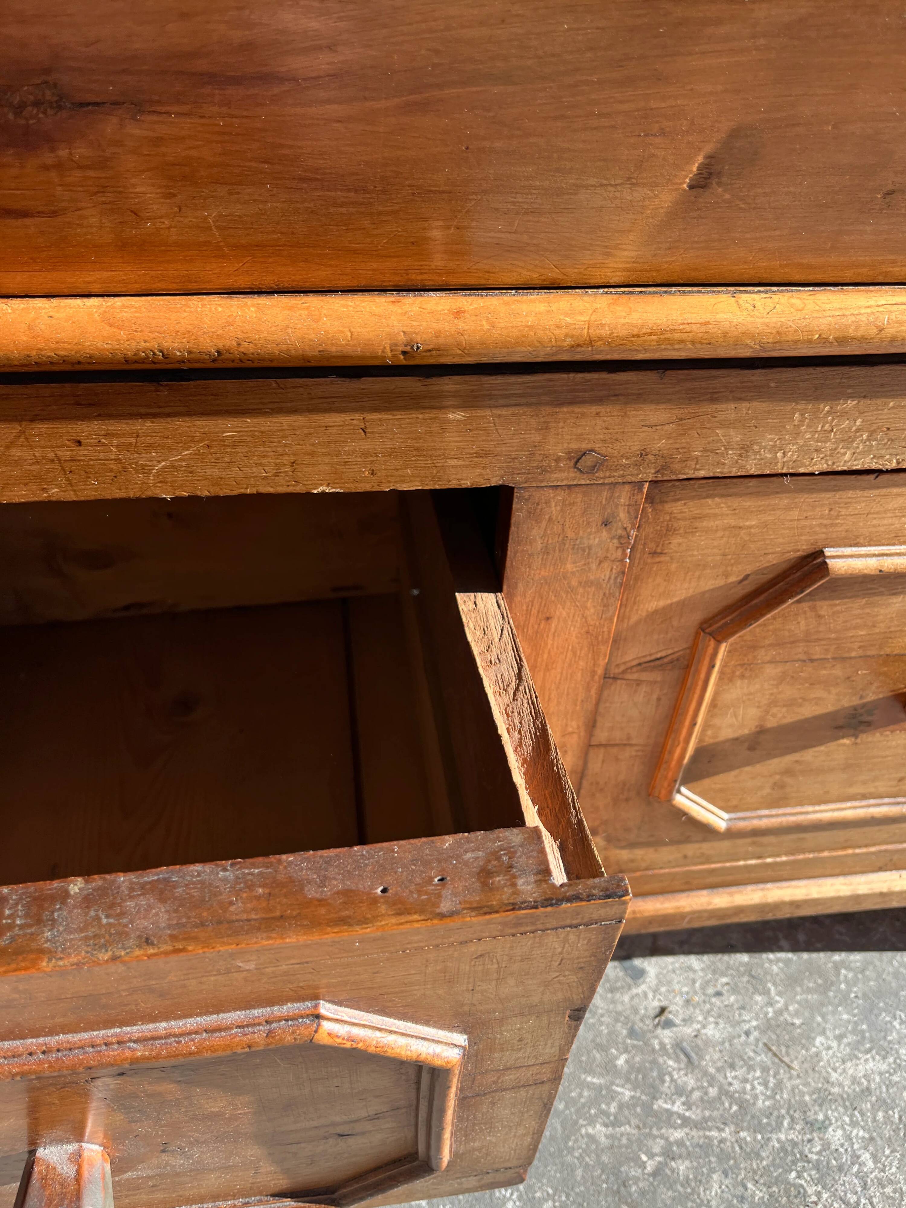 Old wooden baker's chest with storage drawers