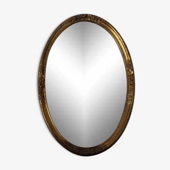 Vintage golden oval mirror