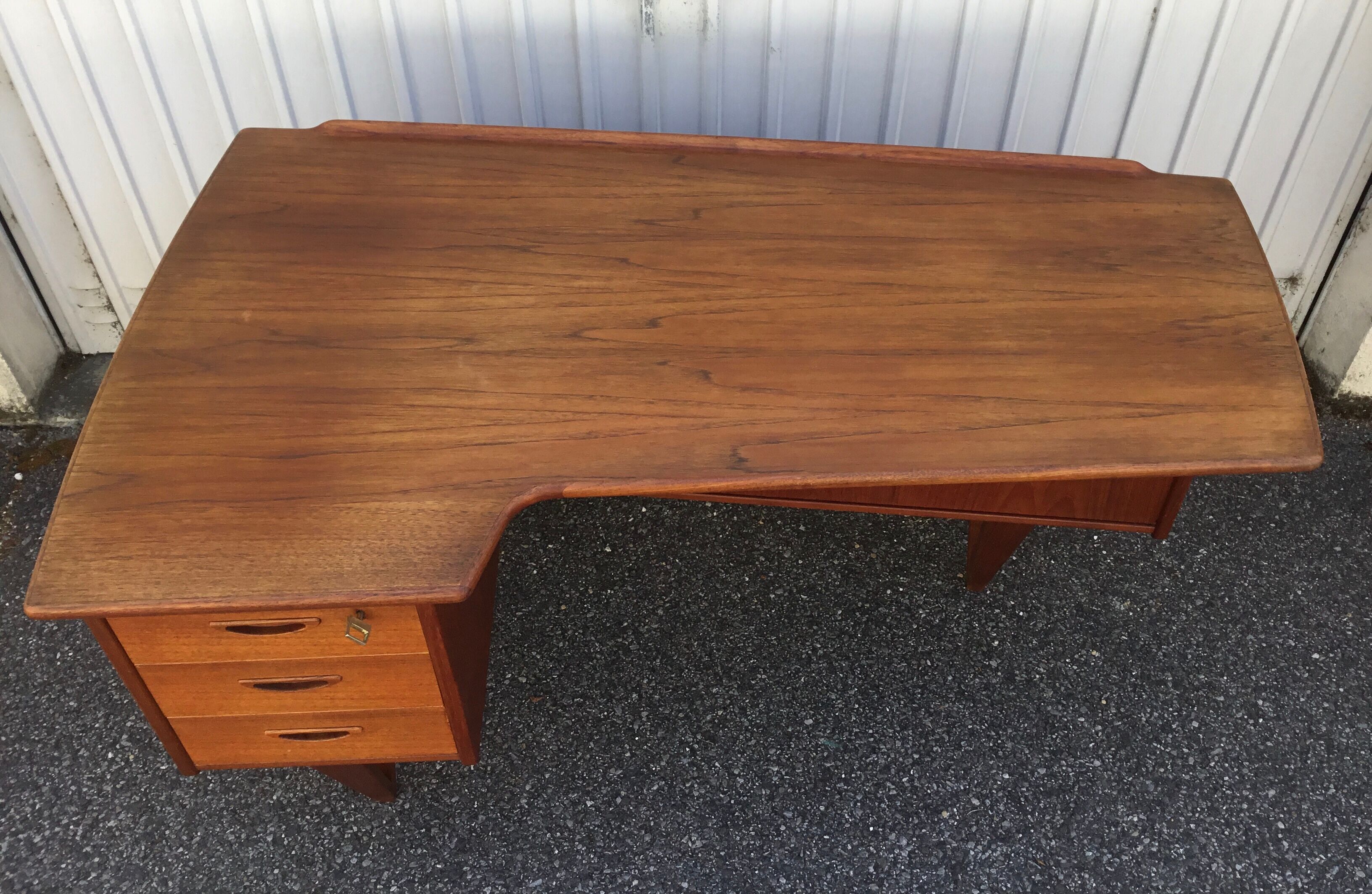 Peter Lovig Nielsen's Scandinavian teak boomerang desk from the 60s
