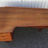 Peter Lovig Nielsen's Scandinavian teak boomerang desk from the 60s
