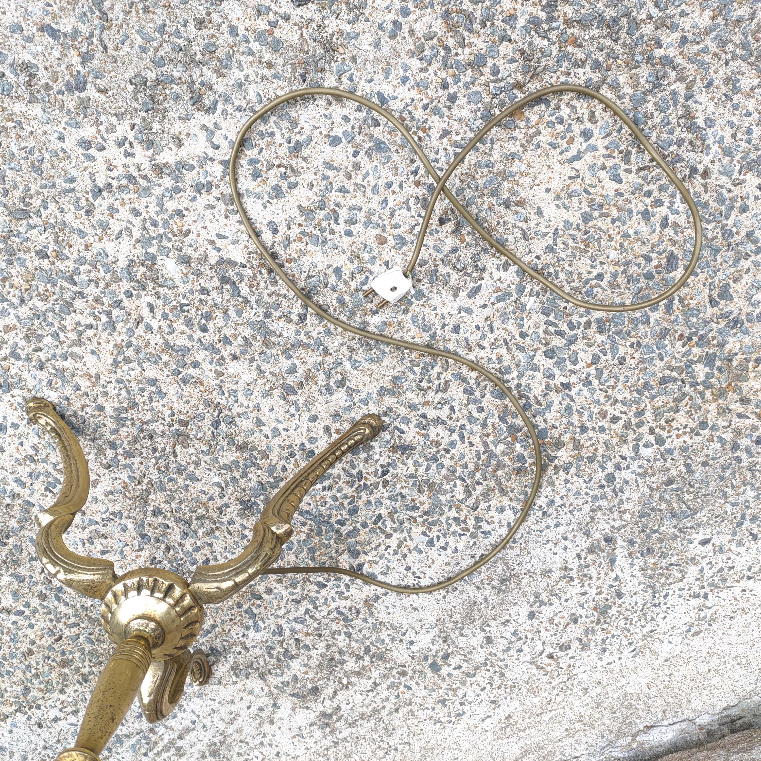 Tripod golden floor lamp