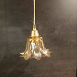 Amber tulip glass portable lamp, golden braided cord.