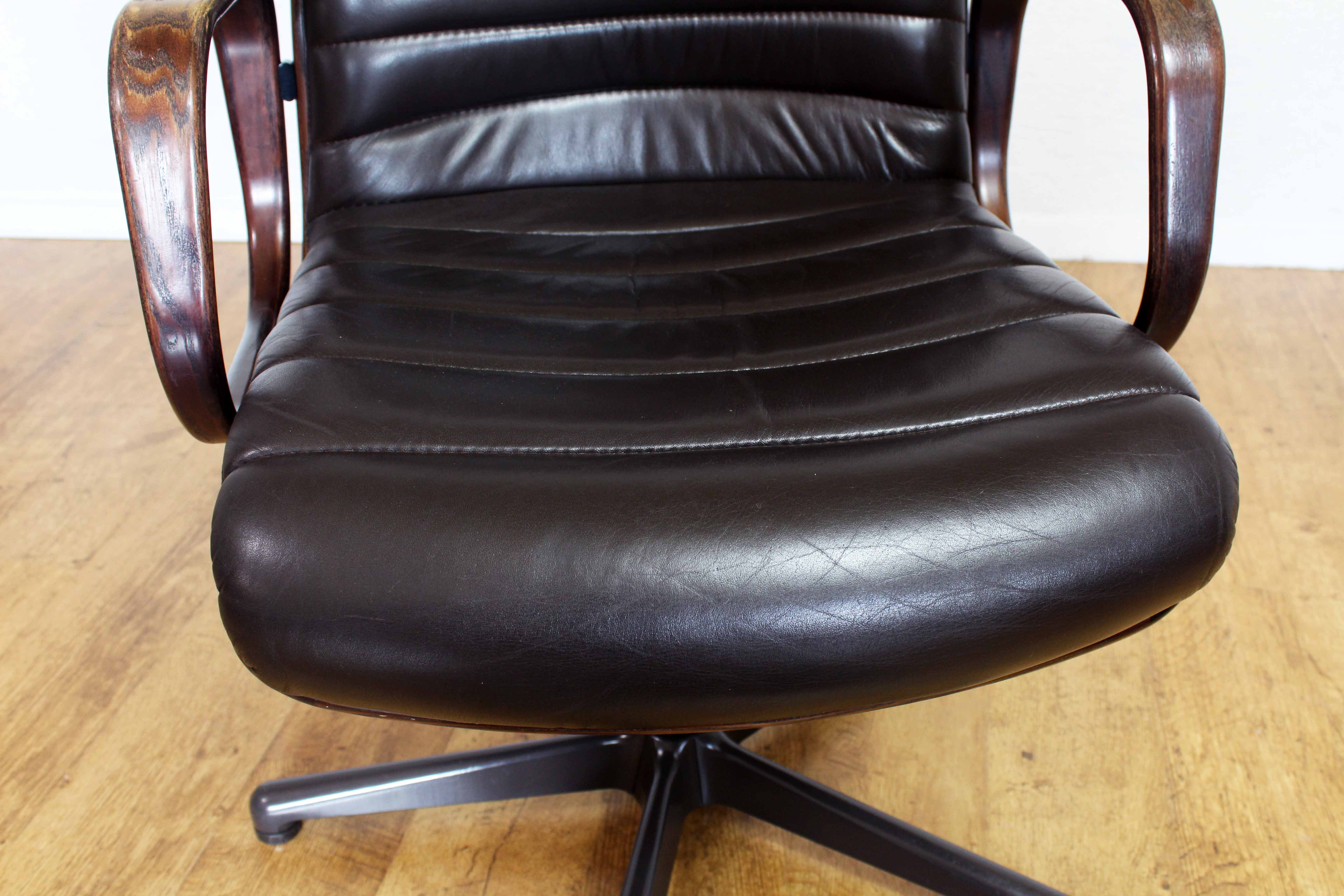 Stoll Giroflex conference chair in leather and 1960s wood