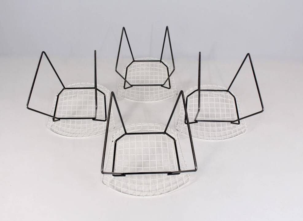 Set of 4 steel Harry Bertoia model 420 chairs
