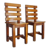 Pair of vintage solid oak chairs from the 1970s.