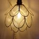 Mother-of-pearl flower in portable lamp or suspension