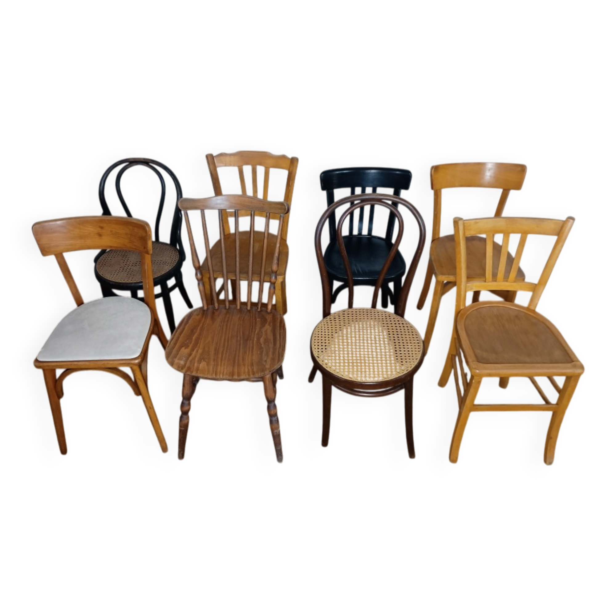 Set of 8 mismatched vintage Baumann Lebrun bistro chairs.