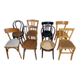Set of 8 mismatched vintage Baumann Lebrun bistro chairs.