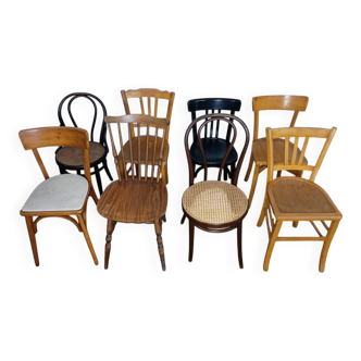Set of 8 mismatched vintage Baumann Lebrun bistro chairs.