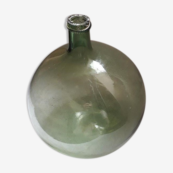 Old blown glass demijohn