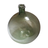 Old blown glass demijohn