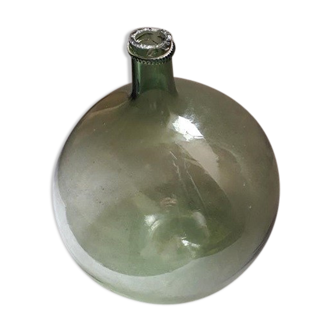 Old blown glass demijohn