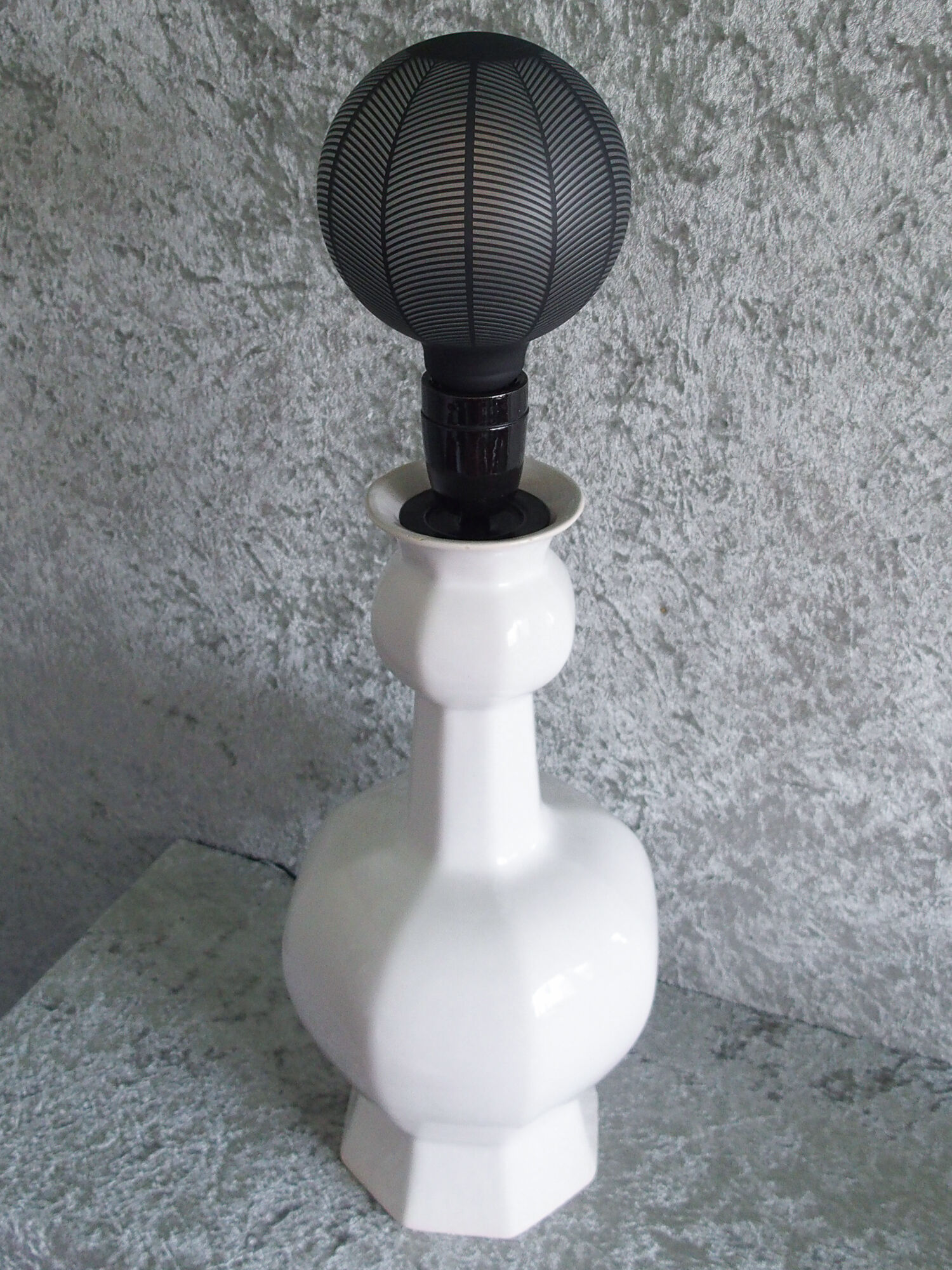 Art Deco-inspired white ceramic lamp