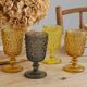 4 vintage stemmed glasses in hobnail glass and smoke colour.
