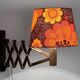 Wall lamp/scissor lamp in died pine wood from Translandia. Denmark 1960s