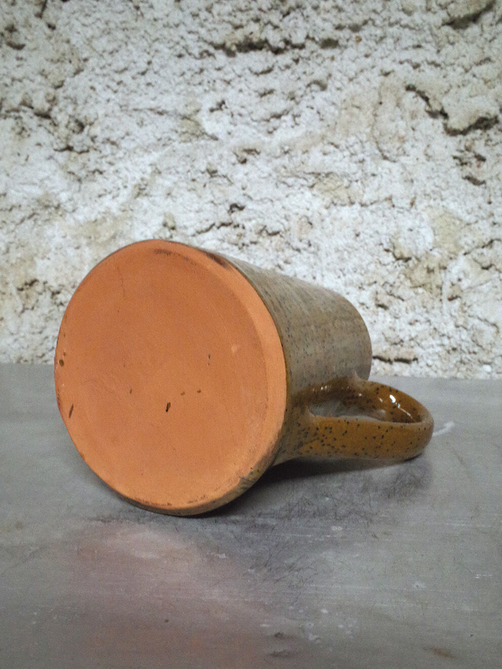 Milk pitcher in spotted sandstone