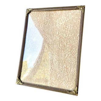 Metal vintage frame in gold colored brass