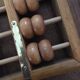 Vintage abacus made of light wood.