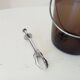 Vintage 1970s ice bucket and tongs.