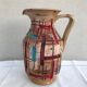 Former beige ceramic pitcher