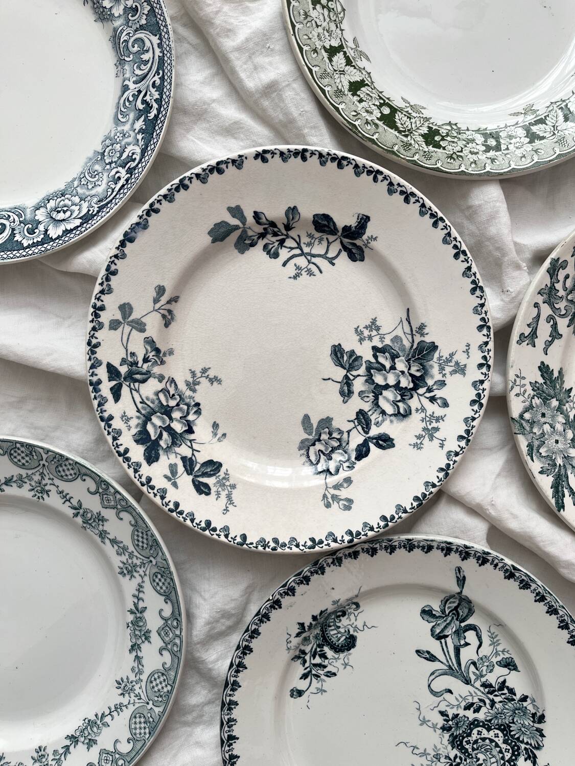 6 mismatched Saint Amand ironware dessert plates